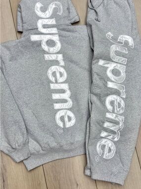 Supreme Gray Crewneck Sweatshirt with White Vertical Logo